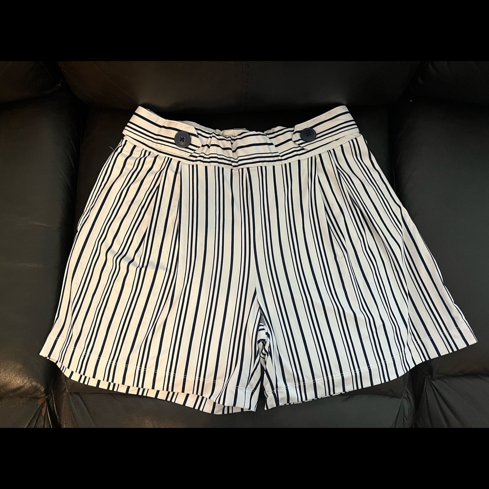 Large striped shorts.